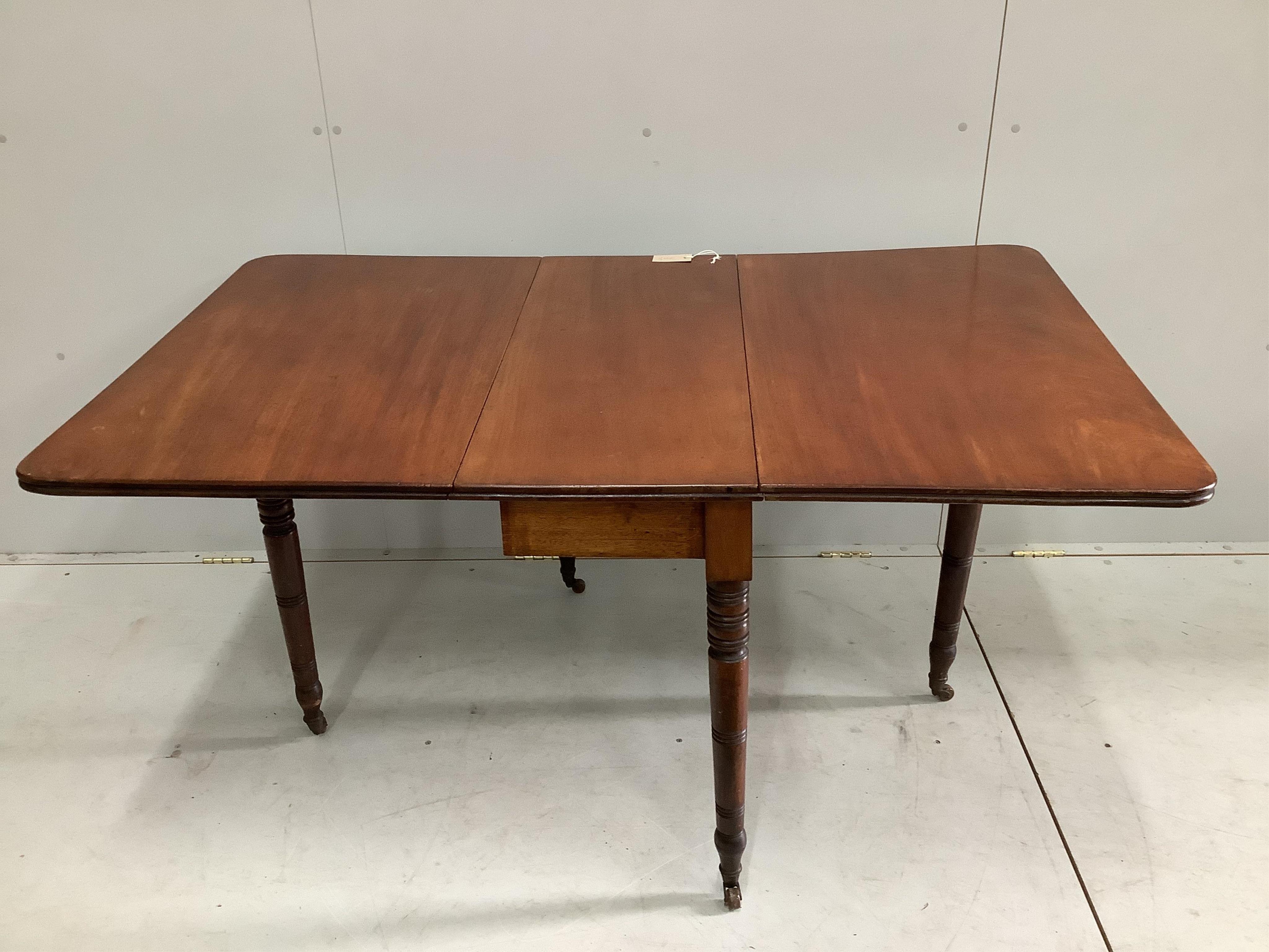 A Regency mahogany drop leaf dining table, width 88cm, depth 42cm, height 71cm. Condition - fair